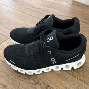 On Running Women's Black and White Slip-On Athletic Shoes